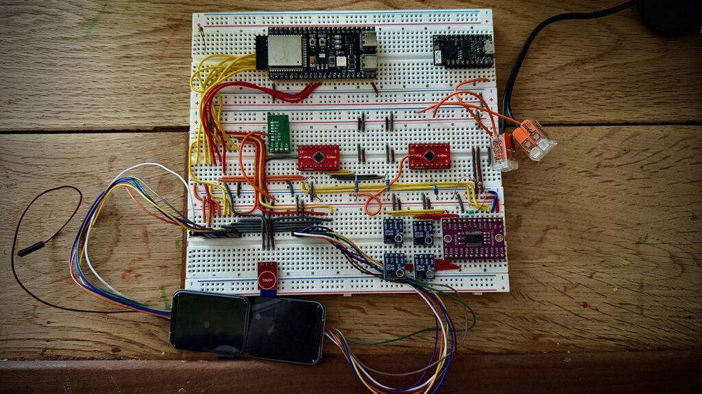 Current ESP32-S3 Aeolus breadboard with sensor multiplexer, fan controller and dual square displays